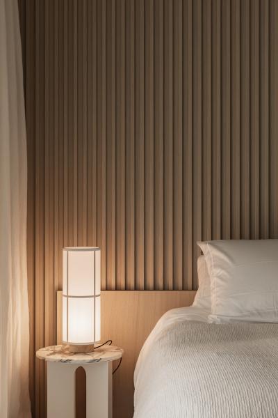 bedhoofd bedwand marmer eik fineer steel look inrichting appartement gewolkt glas structuurglas figuurglas keramiek